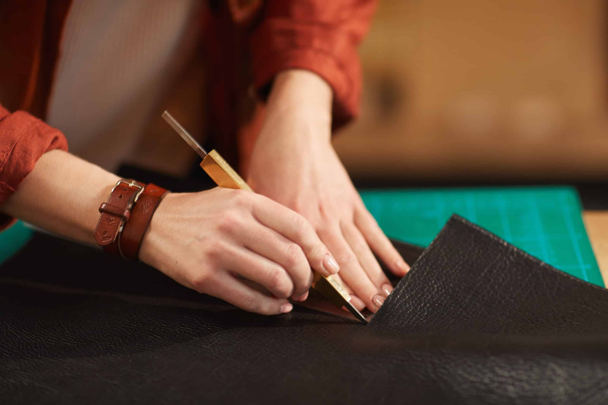 Artisan Cutting Out Leather